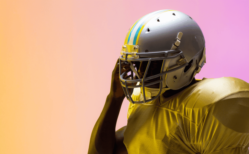 Davante Adams catching a football during an NFL game.