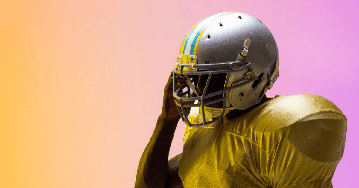 Davante Adams catching a football during an NFL game.